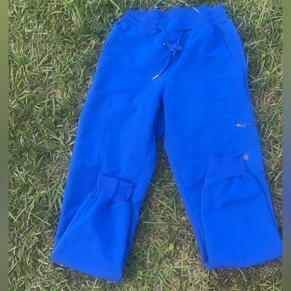White cross scrub joggers
